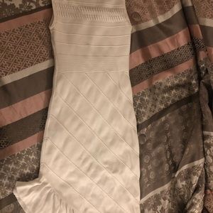 White knit sweater dress with ruffle hemline